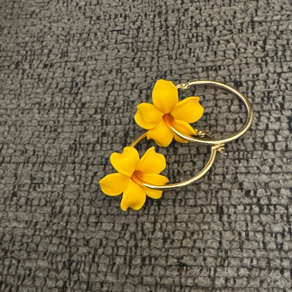 Gold plated yellow/orange puakenikeni hoop earrings